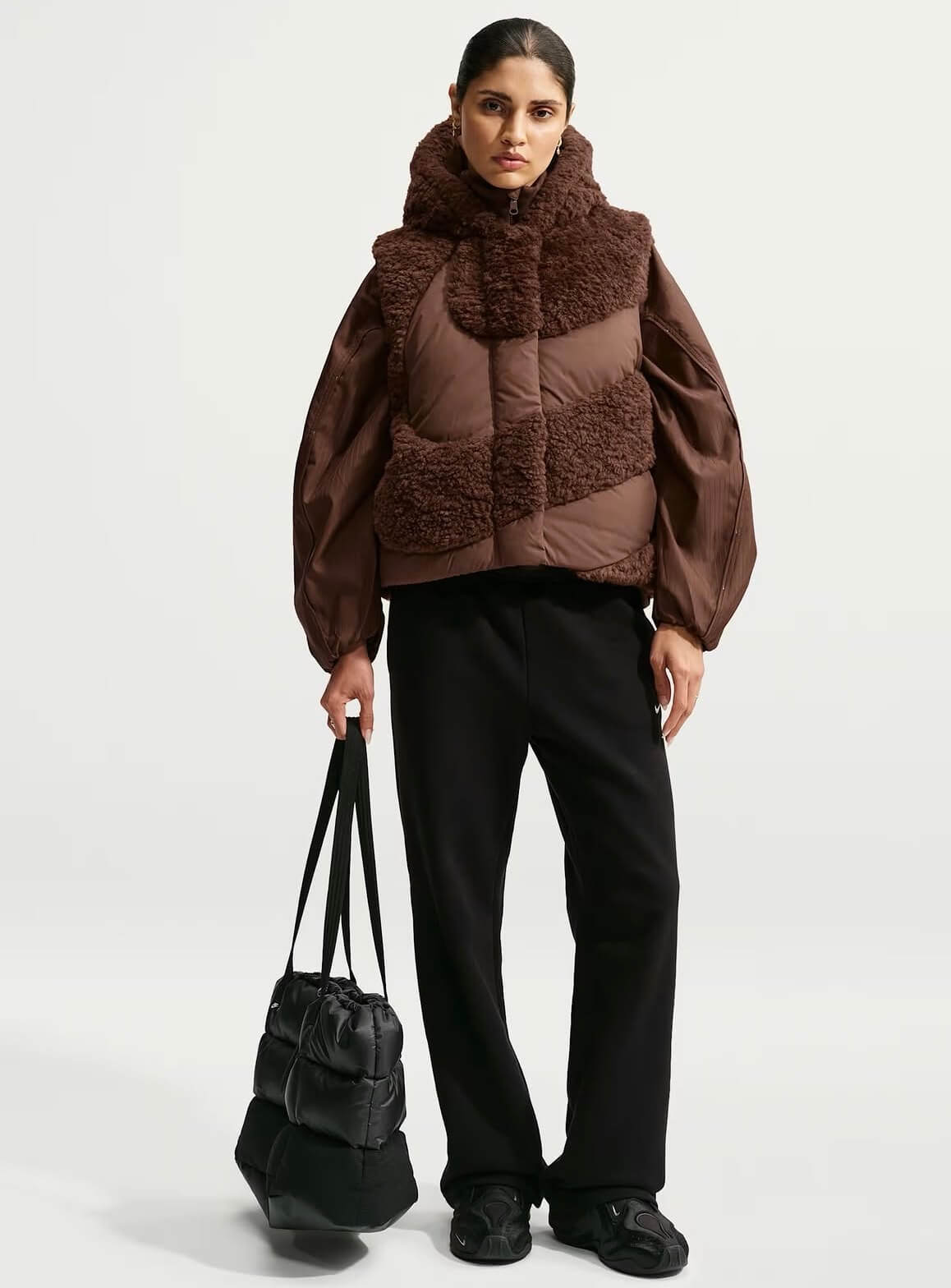 Nike women’s brown fleece and padded vest with oversized collar and hood