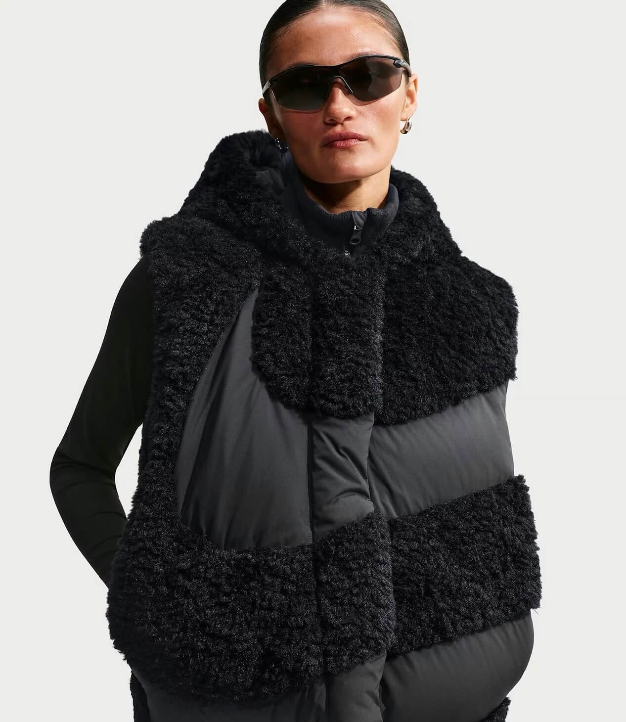 Nike women’s brown fleece and padded vest with oversized collar and hood