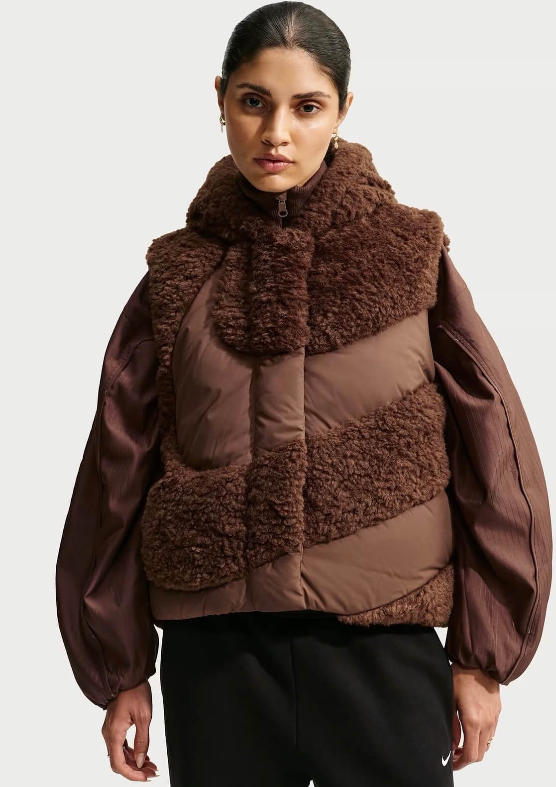 Nike women’s brown fleece and padded vest with oversized collar and hood